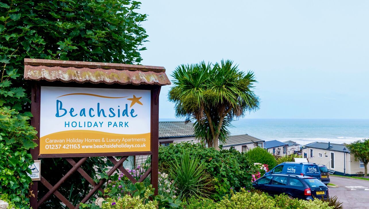 Beachside welcome sign to the park