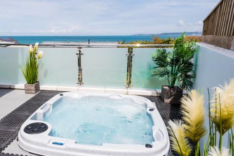 A Hot Tub on an Outdoor Area of an Apartment on a Holiday Park 