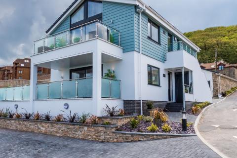 Exterior Photograph of Two Apartments on a Holiday Park