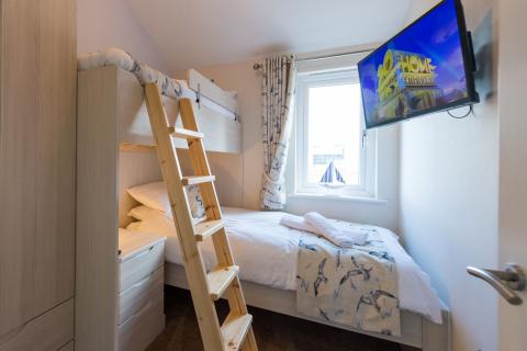 Twin Bedroom of an Apartment on a Holiday Park