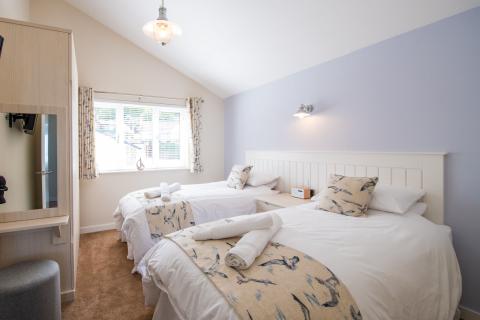 Twin Bedroom of an Apartment on a Holiday Park