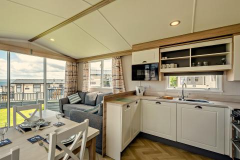 Lounge and Dining Area in a Caravan Holiday Home with Sea Views