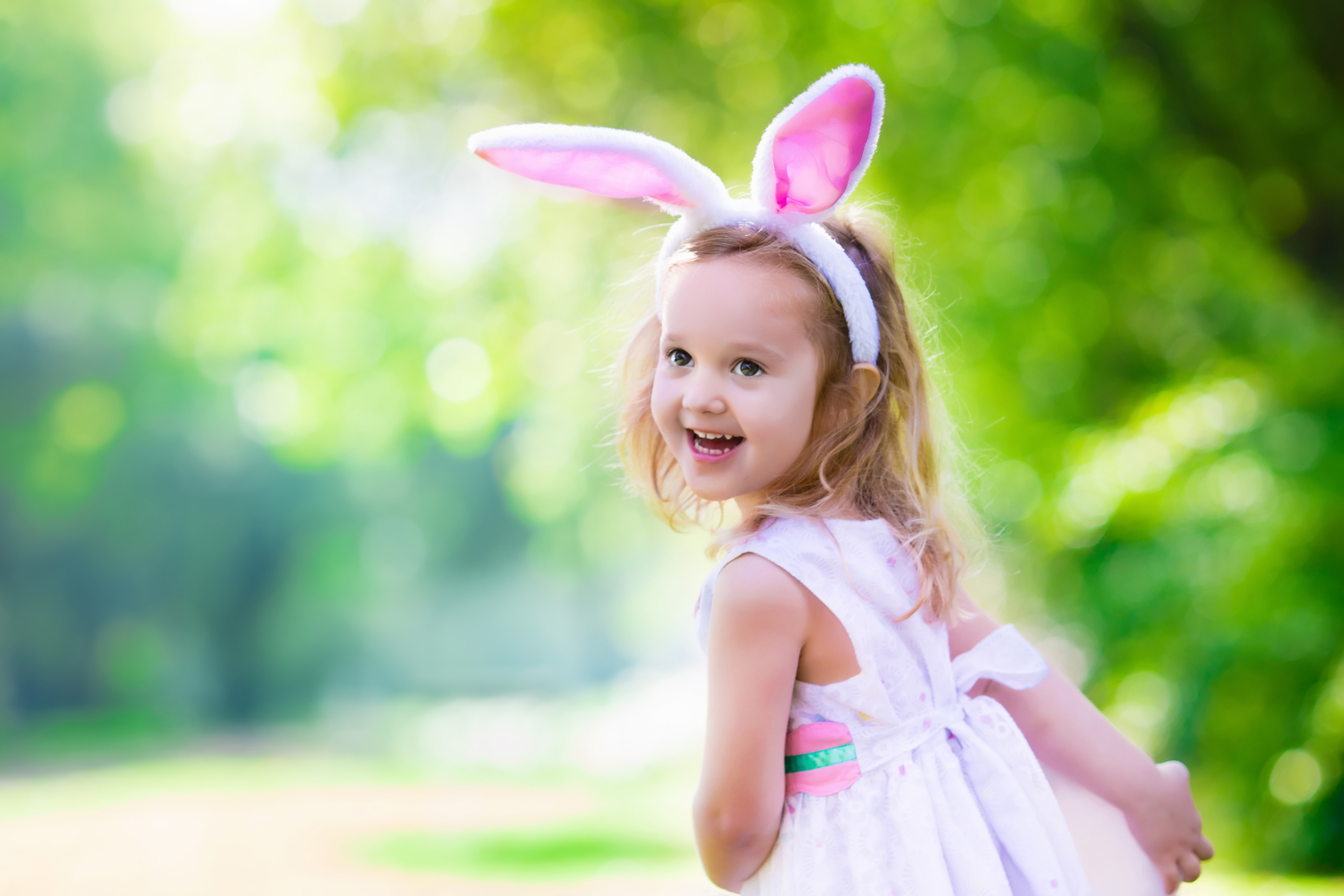 small girl playing at easter