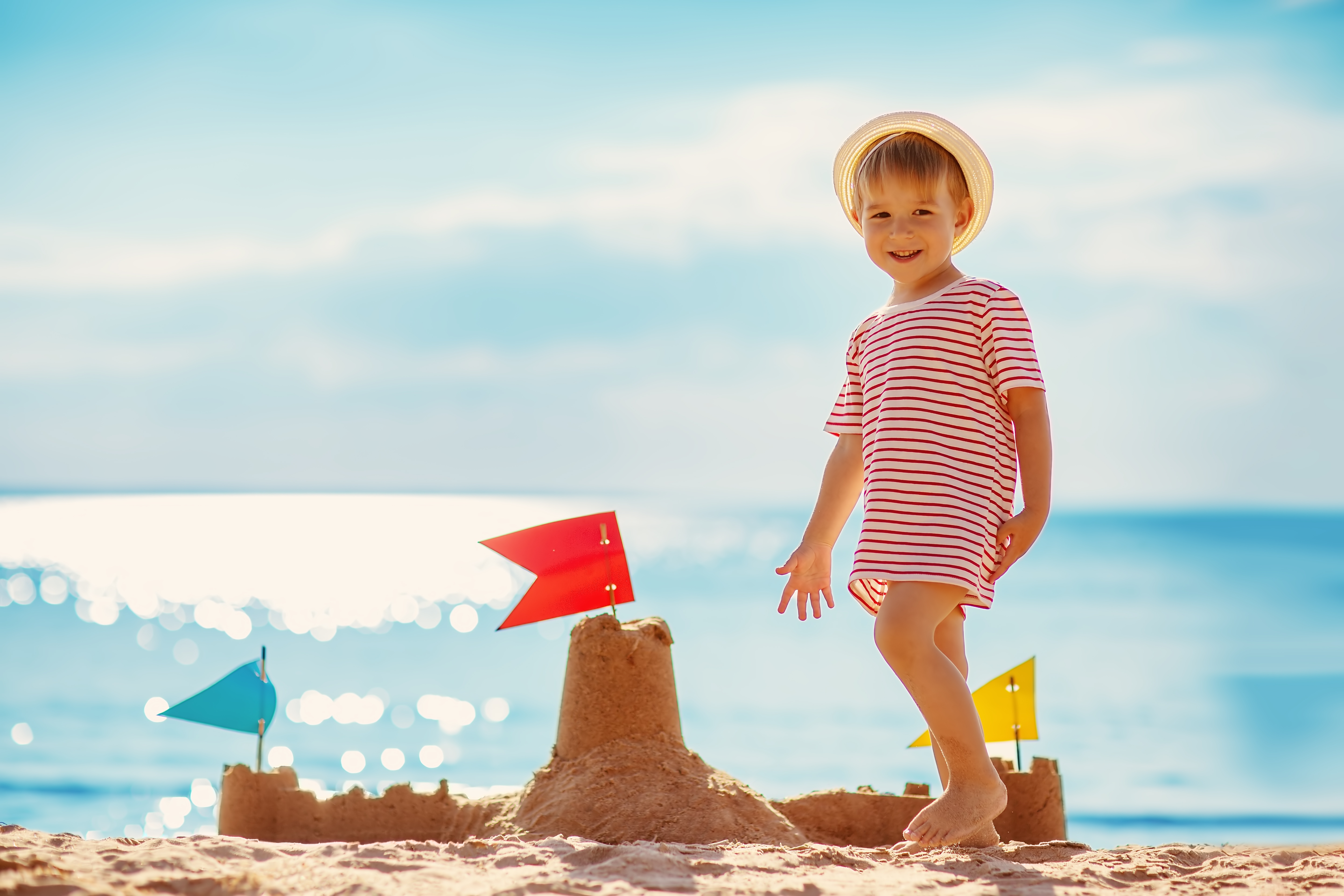Child making sandcastles