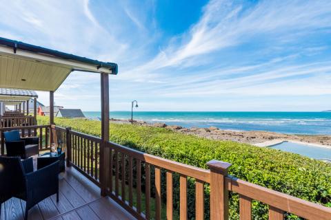 Holiday Accommodation Overlooking a Natural Beach Pool and Beach