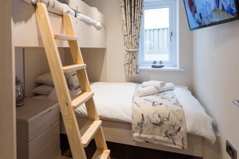 Twin Bedroom of an Apartment on a Holiday Park